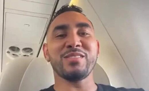 Dimitri Payet em avião a caminho do Brasil