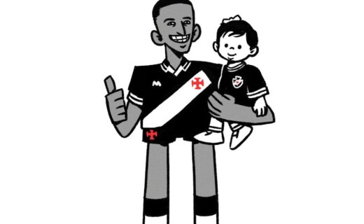 Vasco jogador sorrindo com torcedor na torcida, usando uniforme.