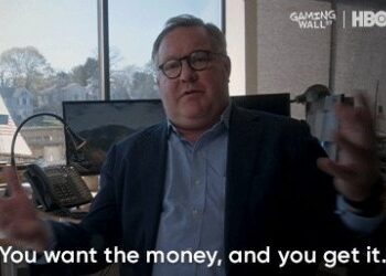 Imagem de um homem de óculos em escritório moderno.