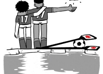 Amigos abraçados, apoiando-se, olhando para o horizonte.