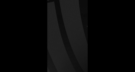 Escudo do Vasco da Gama em fundo preto.