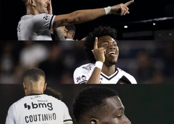 Jogador comemorando gol com torcida.