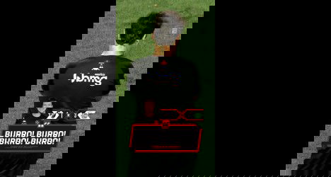 Jogador dirigente com uniforme do Vasco.