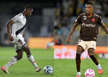 Jogador em ação com uniforme do Vasco e bola no estádio.